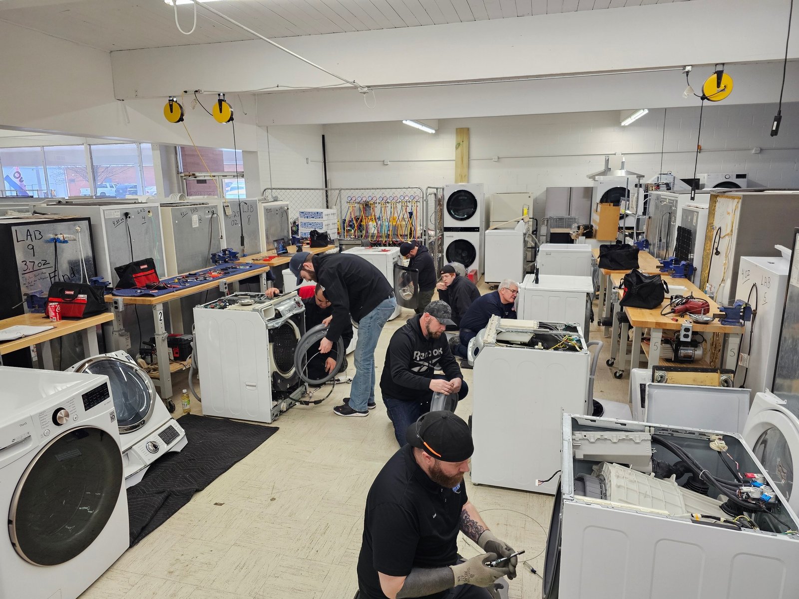 Elite Home Appliance Repair technician on a service call in Dubai